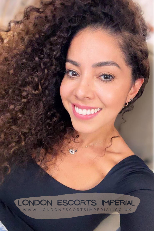London Escort Girl Curly Hair 36A